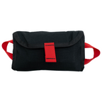Refuge Medical OPFAK First Aid Kit - Black inner pouch with red handles on both sides and a red pull tab