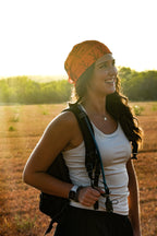 person wearing the triangular bandage on their head